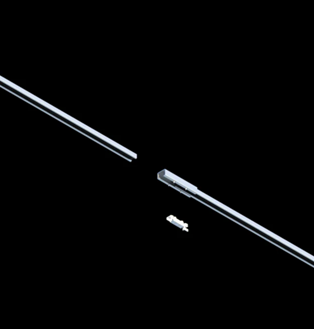 Exploded view of Track Busway joiner with conductor insert for continuing power between two sections