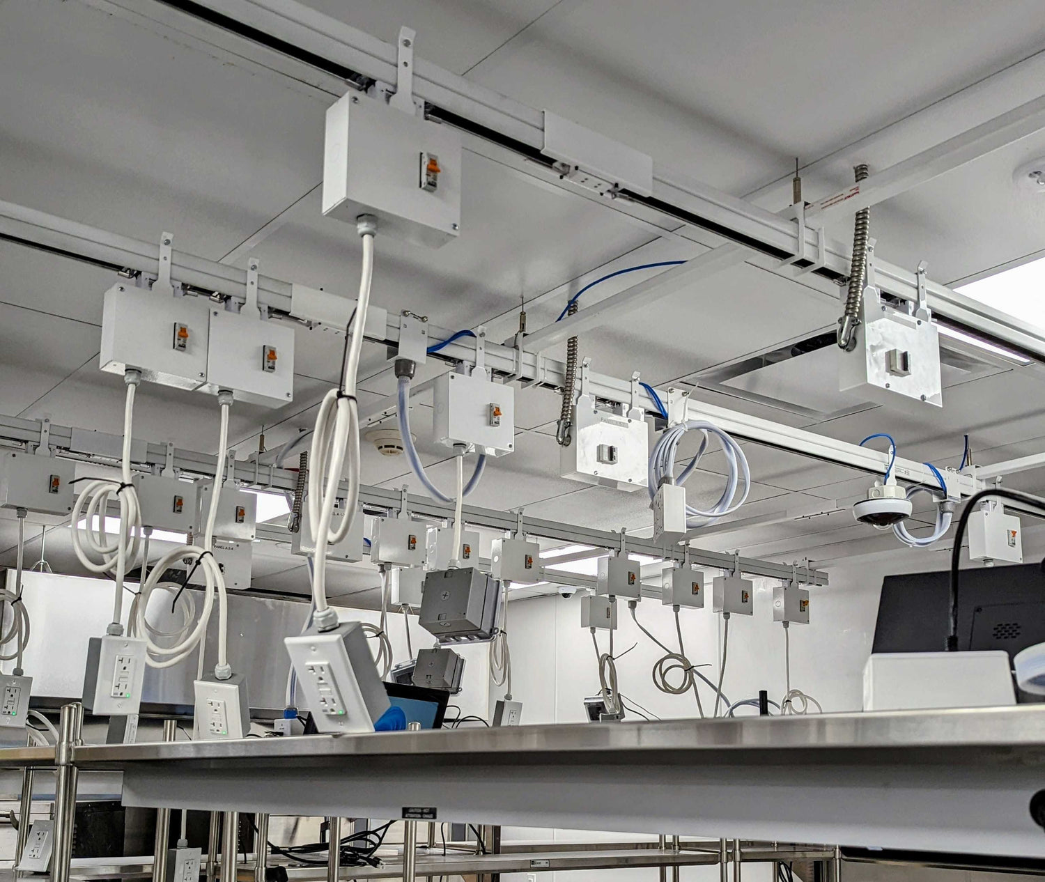 Research facility with overhead Track Busway system supporting lab equipment