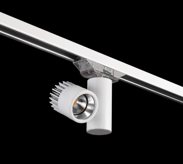 Adjustable LED spotlight mounted on Track Busway for directional lighting applications