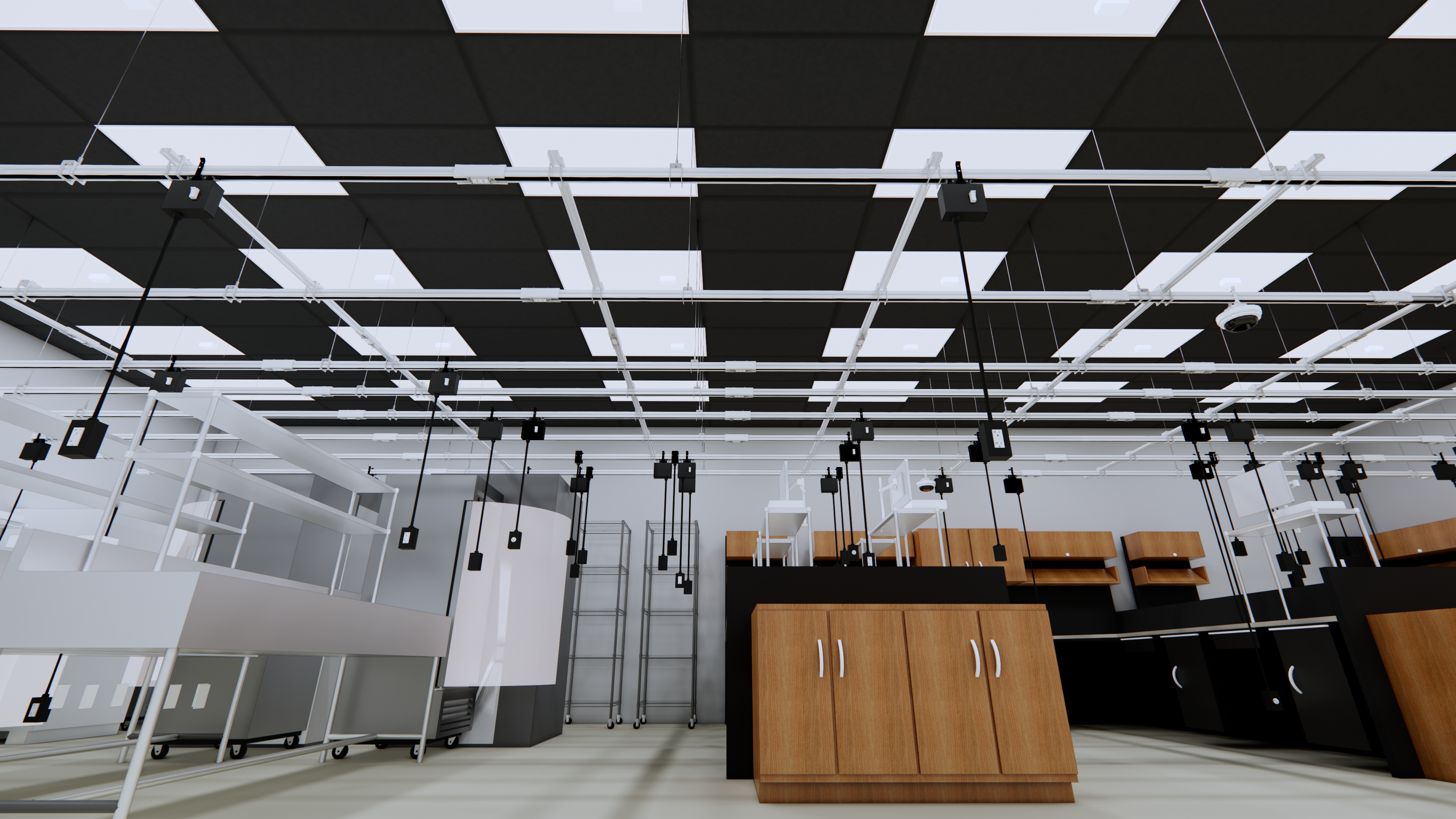 lab environment with track busway grid suspended and power drop cords with duplex plug ends