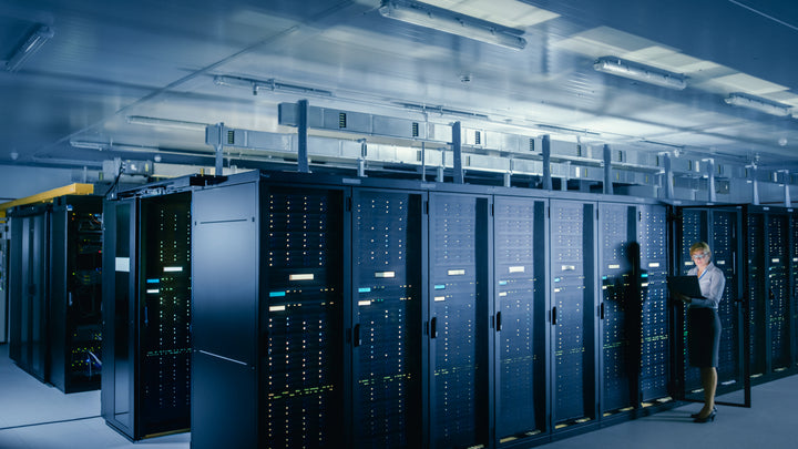 Data center aisle with overhead Track Busway and critical power monitoring