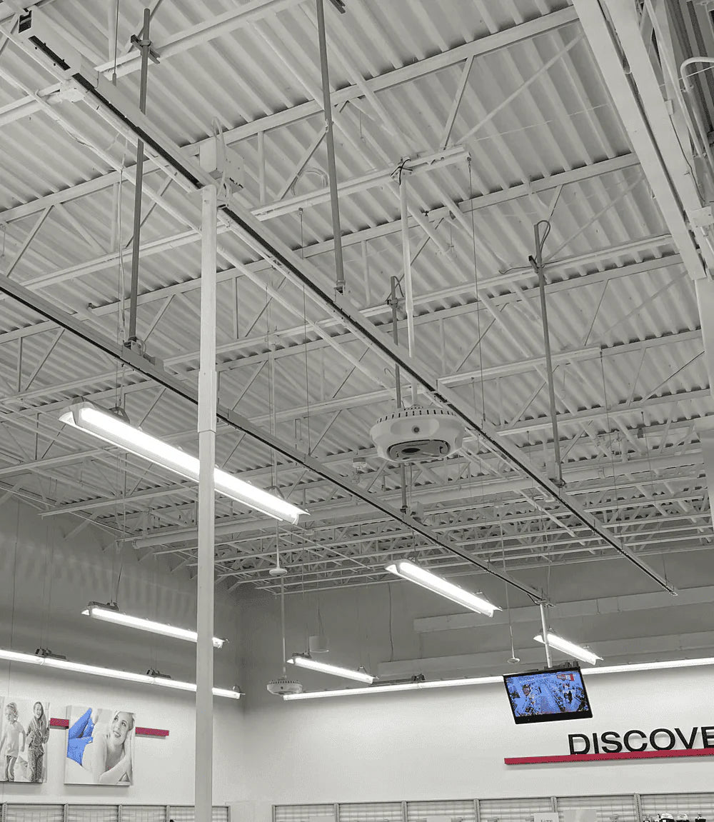 Suspended busway stacked with unwired strut to slide equipment into place