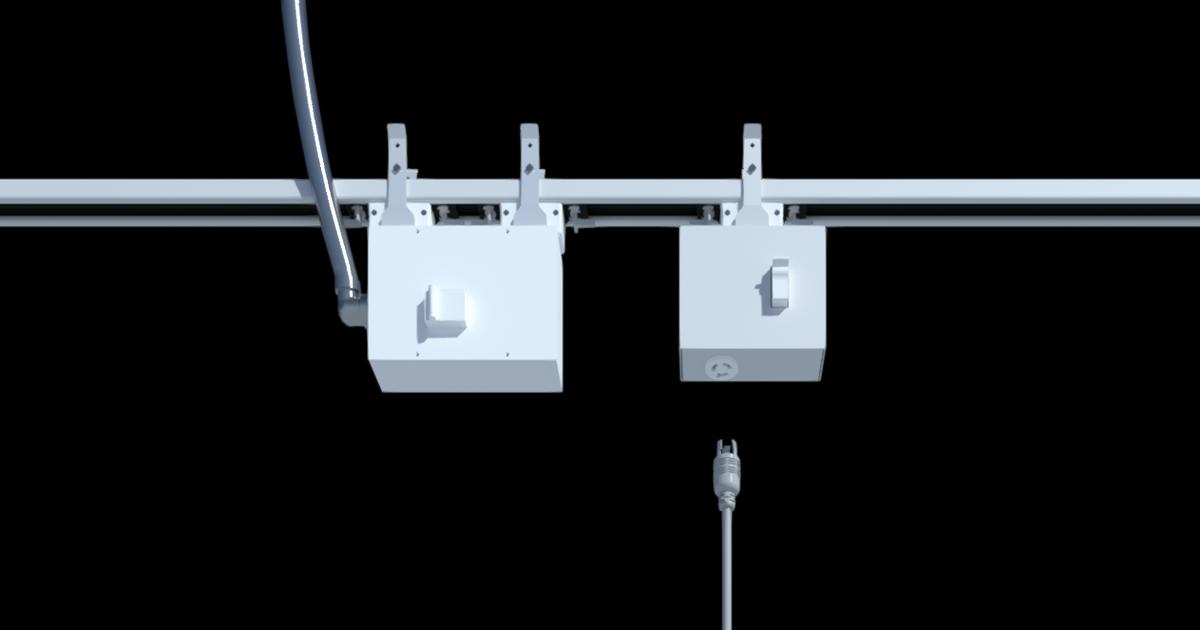 Rendering of a receptacle plug‑in module with connectors on top and an electrical outlet on the side