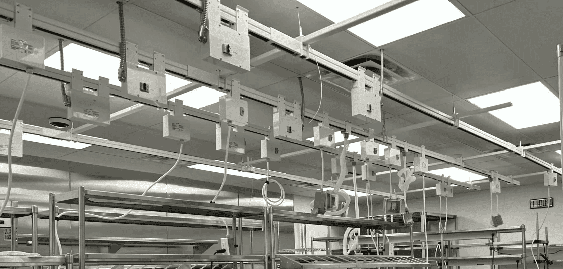Track Busway plug-in power drops positioned above laboratory work areas