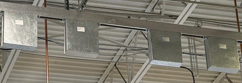 Rear view of tap-off enclosures on an installed 225A Track Busway run