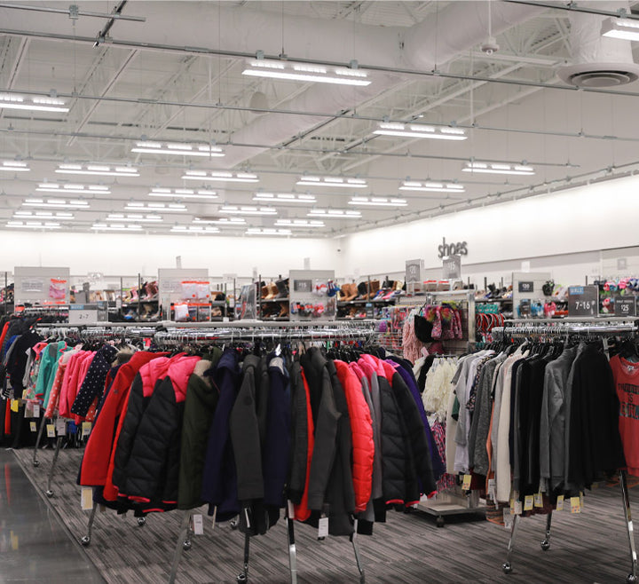 Retail space with suspended Track Busway ROWs and linear lighting